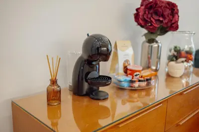 a coffee maker sitting on top of a counter at Home With a Pool by Vacationy in Porto