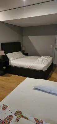 two beds in a room with two beds sidx sidx sidx at Santa Catarina´s Soul in Porto