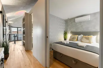 a bedroom with a large bed in a room at GuestReady - Elegant living in Porto city centre in Porto