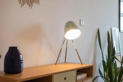 a lamp sitting on top of a wooden shelf at Santo António Loft - Porto Perfect in Porto