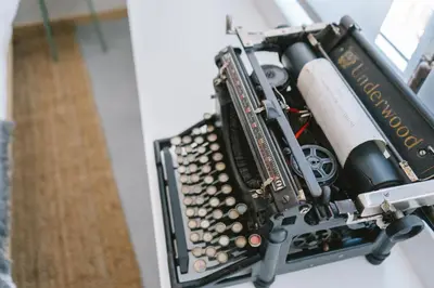 a close up of an old typewriter with a book at Porto Serenity loft. in Porto