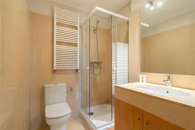 a bathroom with a toilet and a shower and a sink at Host Wise - Gorgeous Spacious Flat - Ace Location in Porto