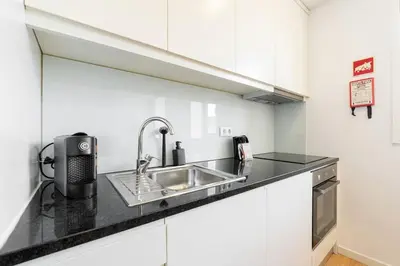 a kitchen with a sink and a counter top at GuestReady - King House 2 in Porto