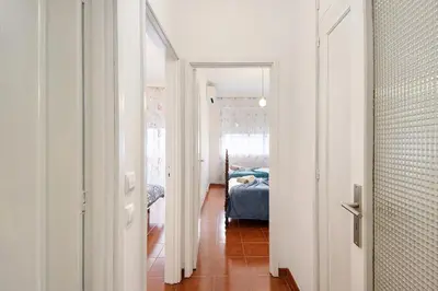 a hallway with a room with a bed at Trindade Porto City Centre in Porto