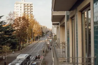 a view of a city street with cars and buses at OPORTO GUEST Renovato Luxus Flat w/ parking in Porto