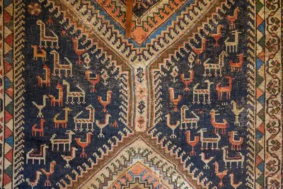 a close up of a rug with chairs on it at Touchy Porto in Porto