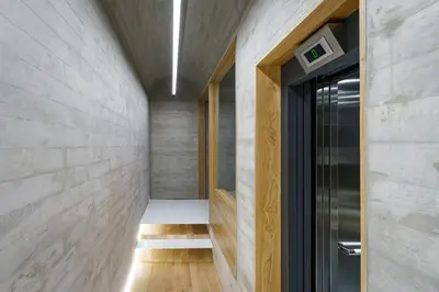 a hallway of a house with a bench in it at Feel Porto Corporate Housing Boavista in Porto