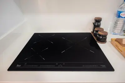 a tablet computer sitting on top of a counter at Santa Catarina Charm Apartment Downtown near Metro in Porto