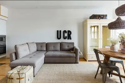 a living room with a couch and a table at 1892 - Ribeira Loft in Porto