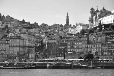 a black and white photo of a city with buildings at Poveiros Oak Loft - Santo Ildefonso in Porto