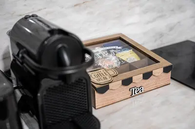 a camera next to a wooden box on the floor at GuestReady - Lovely heaven in Porto in Porto