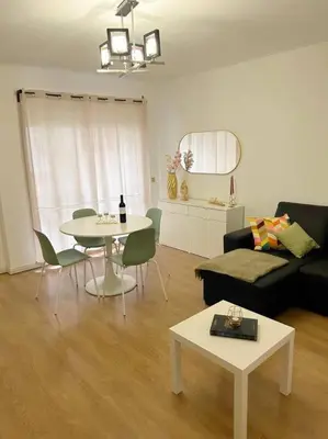 a living room with a couch and a table at Oporto Music Flat - Very Central & Free Parking in Porto