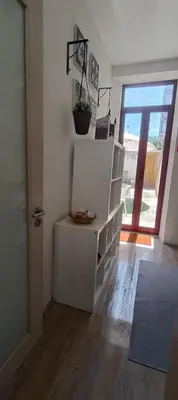 a bedroom with a bed with towels on it at Boho House Terrace in Porto