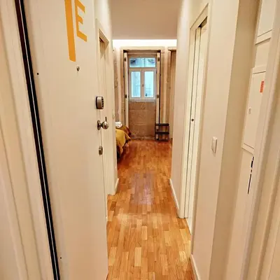 an empty hallway with a hallwayngthngthngthngthngthngthngthngthngthngth at ALMARELA apartments in Porto