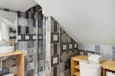 a bathroom with a toilet and a sink at Porto Bello - Apartamento -1 in Porto