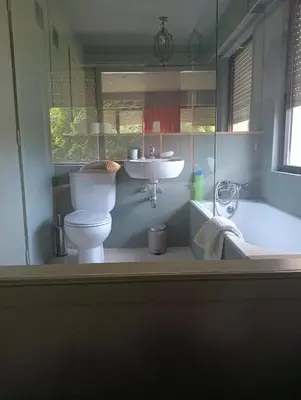 a bathroom with a toilet and a sink and a tub at Praceta in Porto