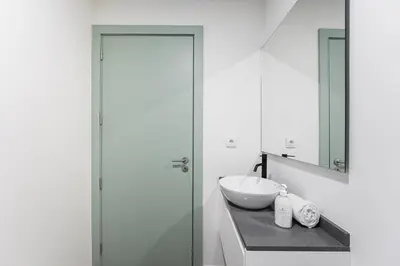 a bathroom with a sink and a mirror at GuestReady - A brilliant stay near Ribeira in Porto