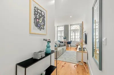 a living room with a couch and a table at Almada Prime - Live in Porto in Porto