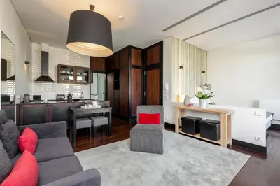 a living room with a couch and a kitchen at YOUROPO - Torre in Porto