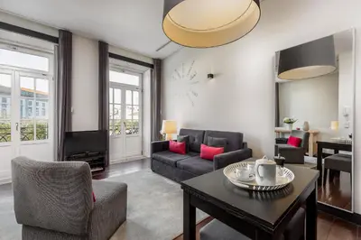 a living room with a couch and a table at YOUROPO - Torre in Porto