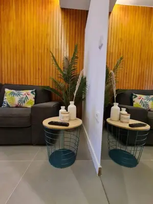 a living room with two tables and a couch at INSOLI I Porto by Apartments2Stay in Porto