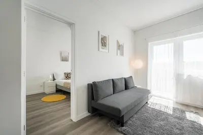 a living room with a couch and a window at GuestReady - A sunny moment in Porto in Porto