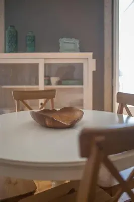 a white table with a hat on top of it at Central location with balcony & equipped kitchen in Porto