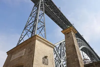 a large steel bridge in the sky at FLH Boavista Woody Duplexes in Porto