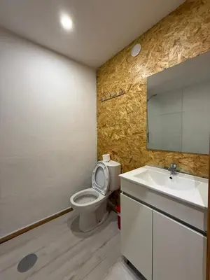 a bathroom with a toilet and a sink at Porto Encanto- 7 Bedrooms in Porto