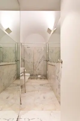 a bathroom with a shower and a tub and a sink at Boutique Rentals- THE CLéRiGoS Apt w/ patio in Porto