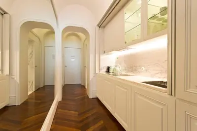 a kitchen with a sink and a counter top at Boutique Rentals- THE CLéRiGoS Apt w/ patio in Porto