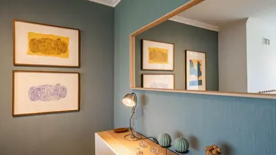 a room with a mirror and a desk with a lamp at Infante Cozy 1BR w Parking by LovelyStay in Vila Nova de Gaia