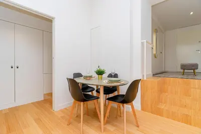 a dining room with a table and chairs at Charming Apartment • Porto in Porto