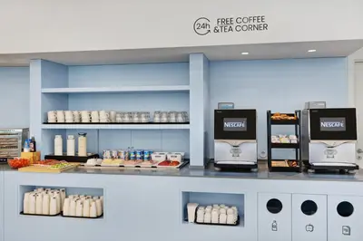 a store with a counter with aasteryasteryasteryasteryasteryasteryasteryasteryastery at B&B HOTEL Porto Gaia in Vila Nova de Gaia