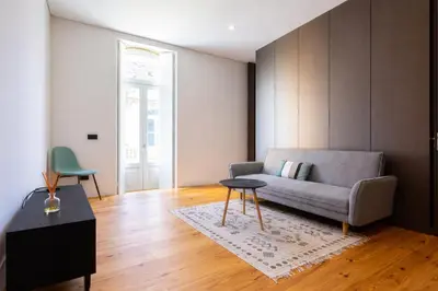a living room with a couch and a table at Dream on - Flow in Porto
