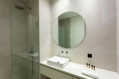 a bathroom with a sink and a mirror at Dream on - Flow in Porto