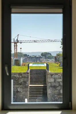 a view from a window of a building with stairs at HM - Oporto Studio Pool Oasis in Porto