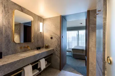 a bathroom with a sink and a mirror at Altis Porto Hotel, a member of Preferred Hotels & Resorts- LVX in Porto