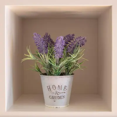 a vase with purple flowers sitting on a shelf at GuestReady - Catorze de Outubro Houses 427 in Vila Nova de Gaia