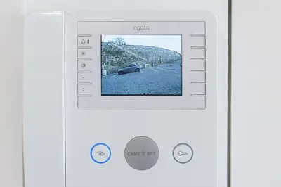 an image of a remote control with a picture of a car at GuestReady - Port Studio 1 in Vila Nova de Gaia