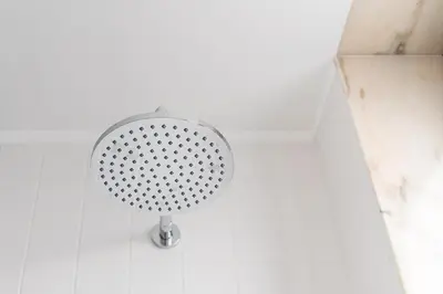 a shower head on the wall of a bathroom at HiddenGem - Cotton Strings in Porto