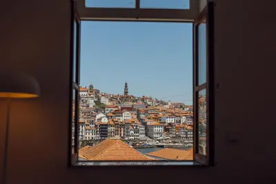a view of a city from a window at Douro Panoramic Views by Vacationy in Porto