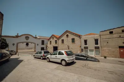 a group of cars parked in a parking lot at Douro Panoramic Views by Vacationy in Porto