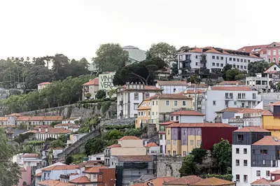 a group of houses on a hill with at Charming Retreat with Balcony in Porto
