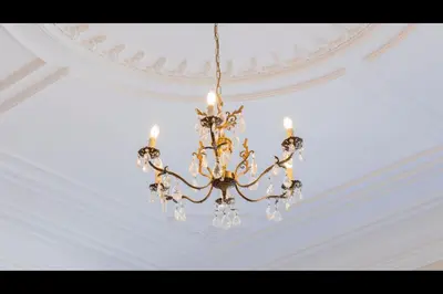 a chandelier hanging from a ceiling at AM Haven Studios - by Unique Hosts in Porto