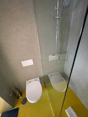 a bathroom with a toilet and a shower at Porto Studio in Porto