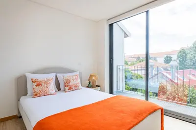 a living room with a couch and a table at Duque de Saldanha Residences in Porto