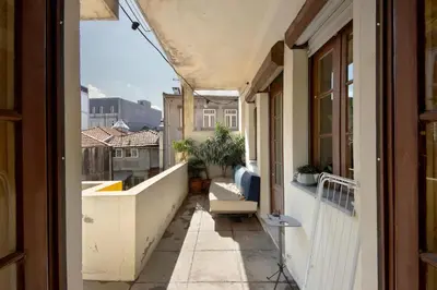 an apartment balcony with a view of the city at A Casa Formosa in Porto