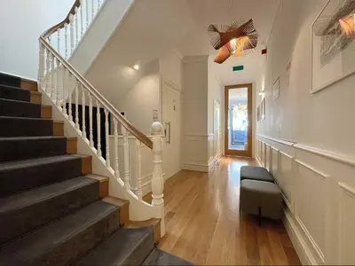 a staircase in a home with a stair case at Essência Portuense Studios in Porto