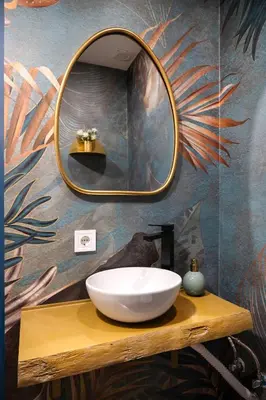 a bathroom with a sink and a mirror on a table at 42 1T Cardosas Block Historic Ap in Porto